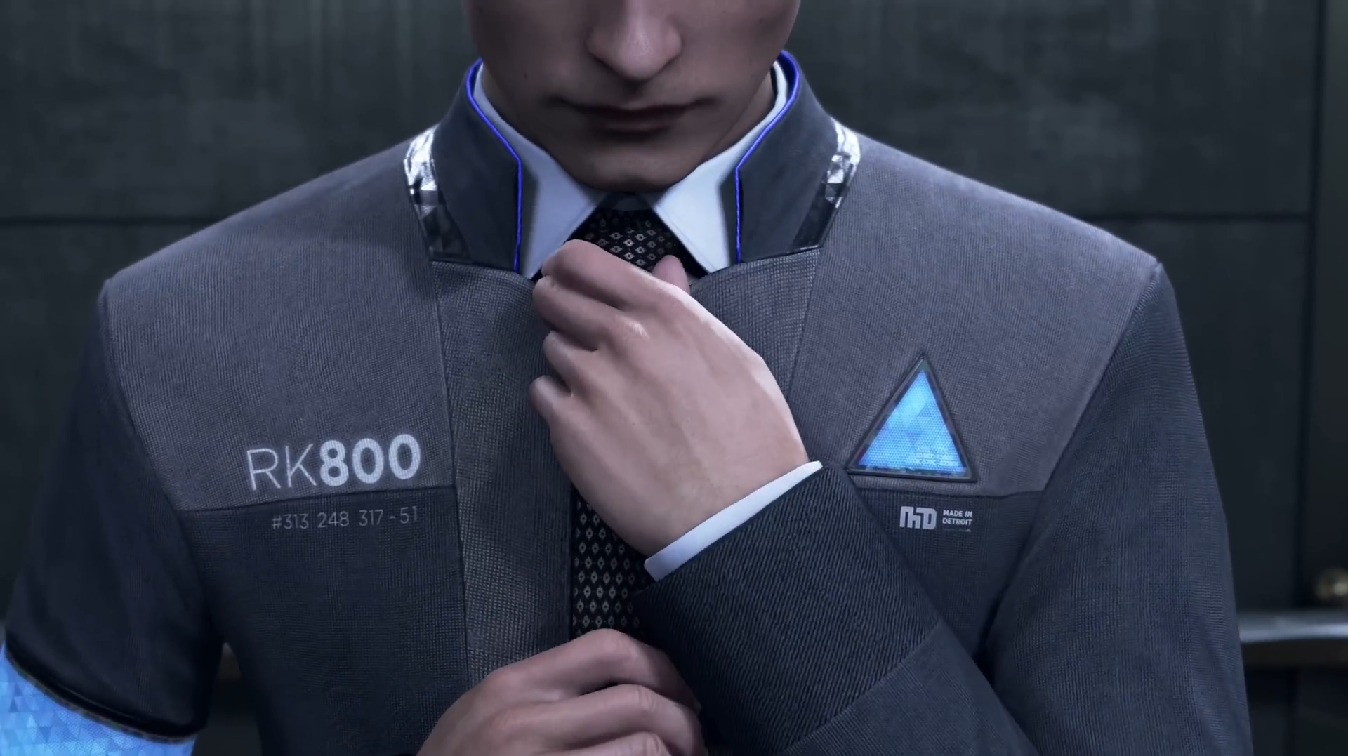 Hands straightening a tie